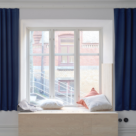 Window with curtains and safe curtain rail