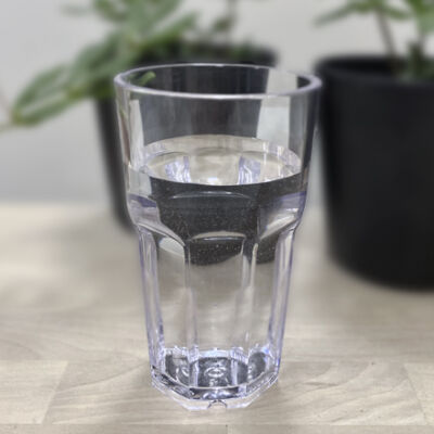 Durable and unbreakable drinking glass with water