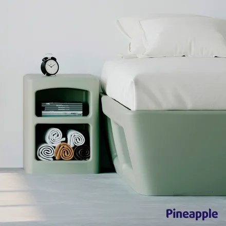 Ryno bed with bedside table and alarmclock