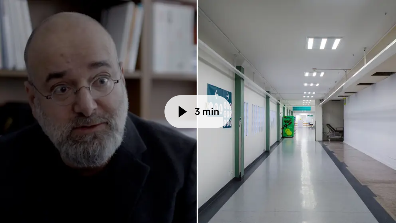 Man talking and hospital corridor