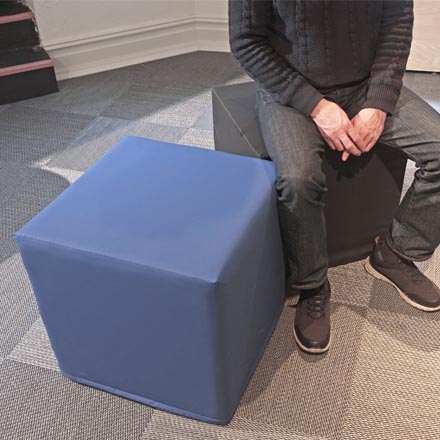 blue and black foam cube stool