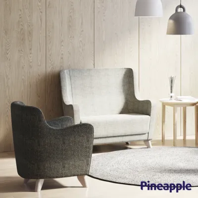 Purl PLUS armchair and 2-seater in a roomsetting